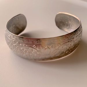 Silver cuff with lotus flower